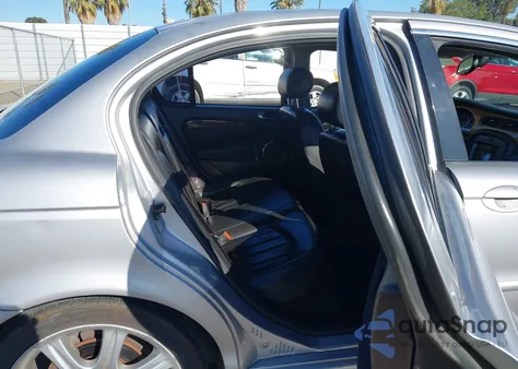 2003 Jaguar X-Type 3.0 из США, поврежденный, VIN SAJEA51C83WD31939